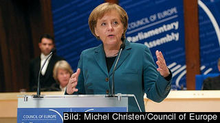 Angela Merkel backar om IMF-lån.